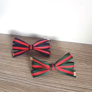 Kẹp tóc nơ Gucci ba cánh