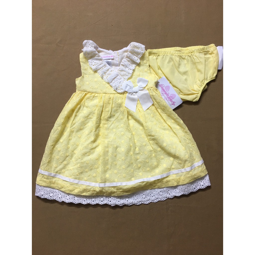 Đầm xòe công chúa bé gái 2 tuổi không tay màu vàng họa tiết hoa dễ thương size 24M hiệu Bonnie baby hàng xách tay mỹ
