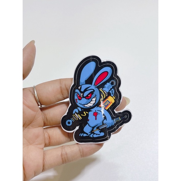 Tem dán hình thỏ điên cầm phuộc Olin, thỏ tay cầm trợ lực kích thước 6x5cm có sẵn keo dán