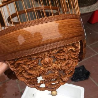 Lồng khuyên song long quy phụ