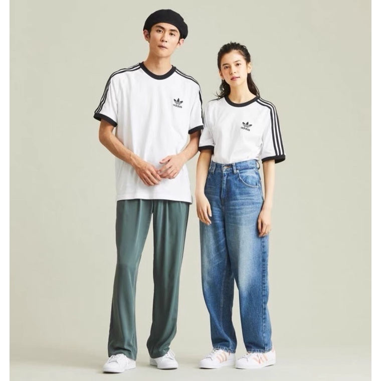 Bộ quần áo Adidas kẻ sọc