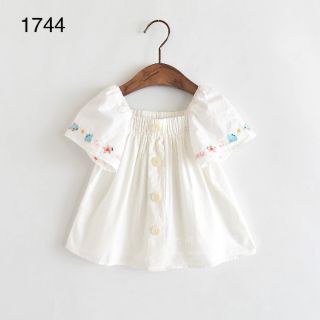 Áo trắng thô phối tay cánh tiên