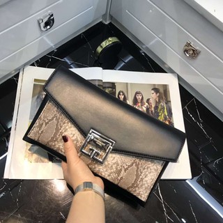 túi xách cầm ta da rắn dự tiệc
