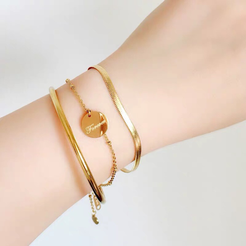 Vòng tay kiểu xương rắn bản rộng bằng thép titan mạ vàng hồng 18k phong cách Âu Mỹ thời trang