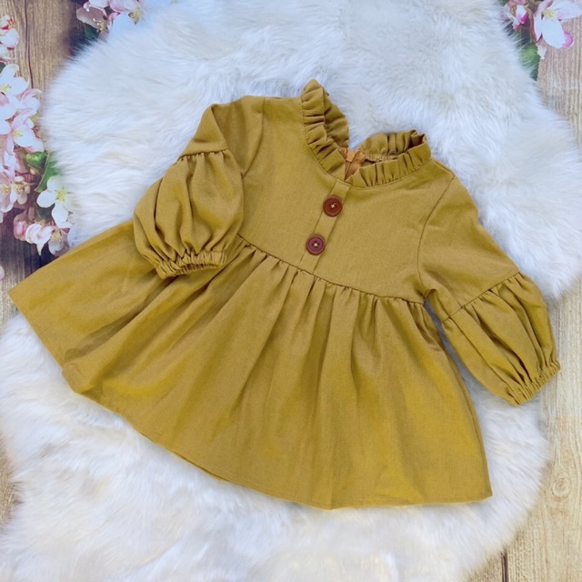 Váy đầm thiết kế thu đông cho bé gái từ 3 tháng tuổi (6-30kg) chất linen bột mềm thoáng màu vàng cốm