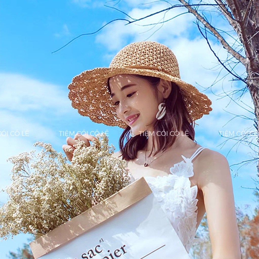 Nón cói đi biển thắt nơ vành đan hoa thưa, mũ cói vành rộng đi biển - Tiệm Cói Cô Lê