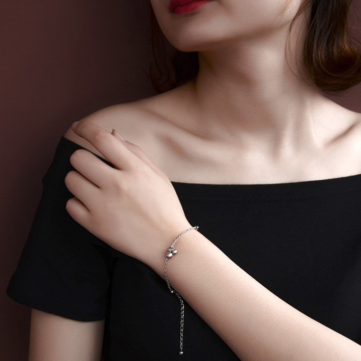 Lắc Tay Lục Lạc Titan Không Đen TT 1339