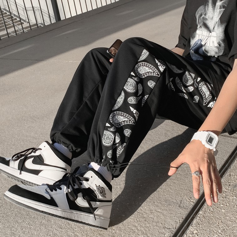 Quần ống rộng họa tiết hoa phong cách thể thao mùa hè mới cho nam và nữ