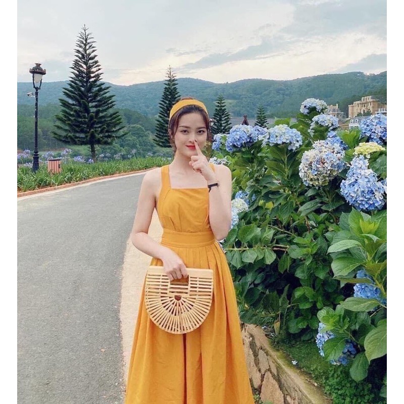 Váy vàng maxi cúp ngực đan dây lưng