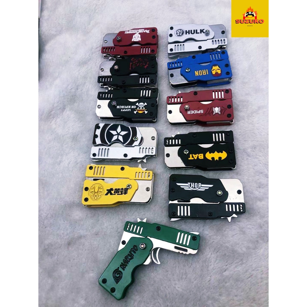 Súng bắn dây thun móc chìa khoá dạng đồ chơi gấp gọn cho trẻ em tặng kèm bia và dây chun M1