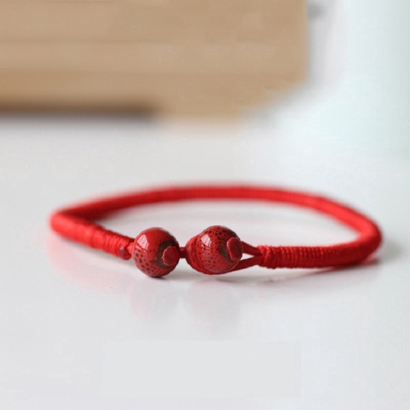 Vòng tay chỉ đỏ xỏ hột thời trang nam nữ