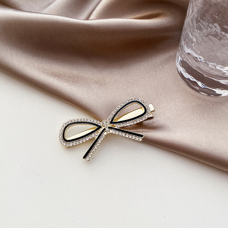 Kẹp Tóc Hình Nơ Đính Ngọc Trai Xinh Xắn