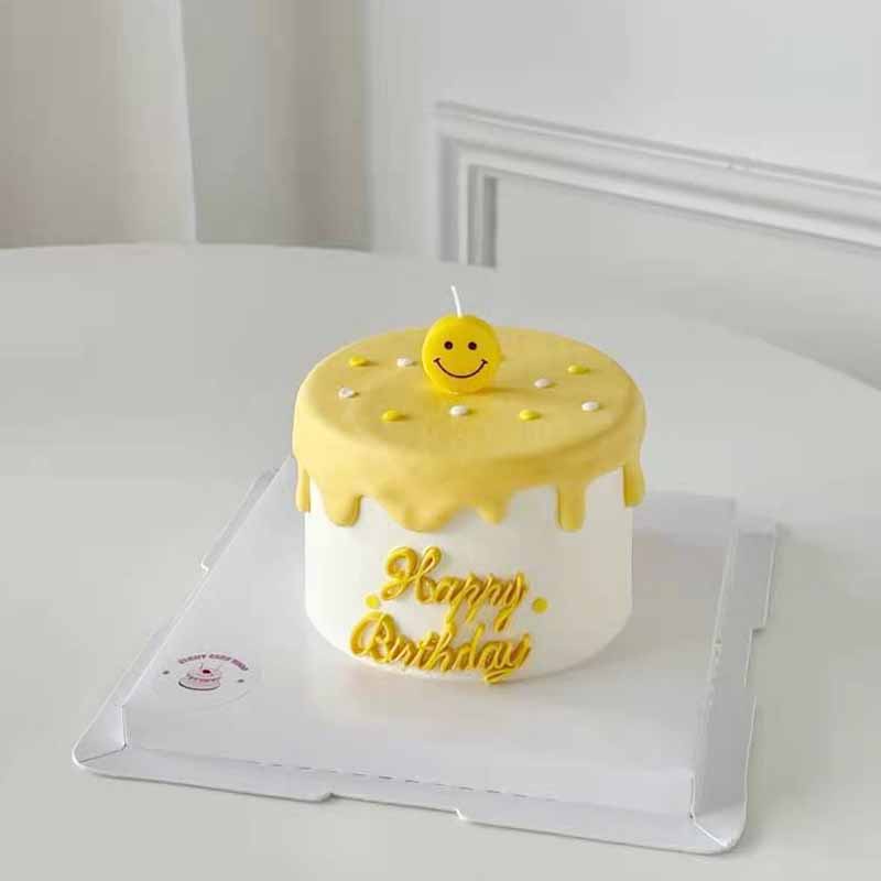 trang trí bánh nến mặt cười vàng cực xinh đẹp (vỉ 5 cây)