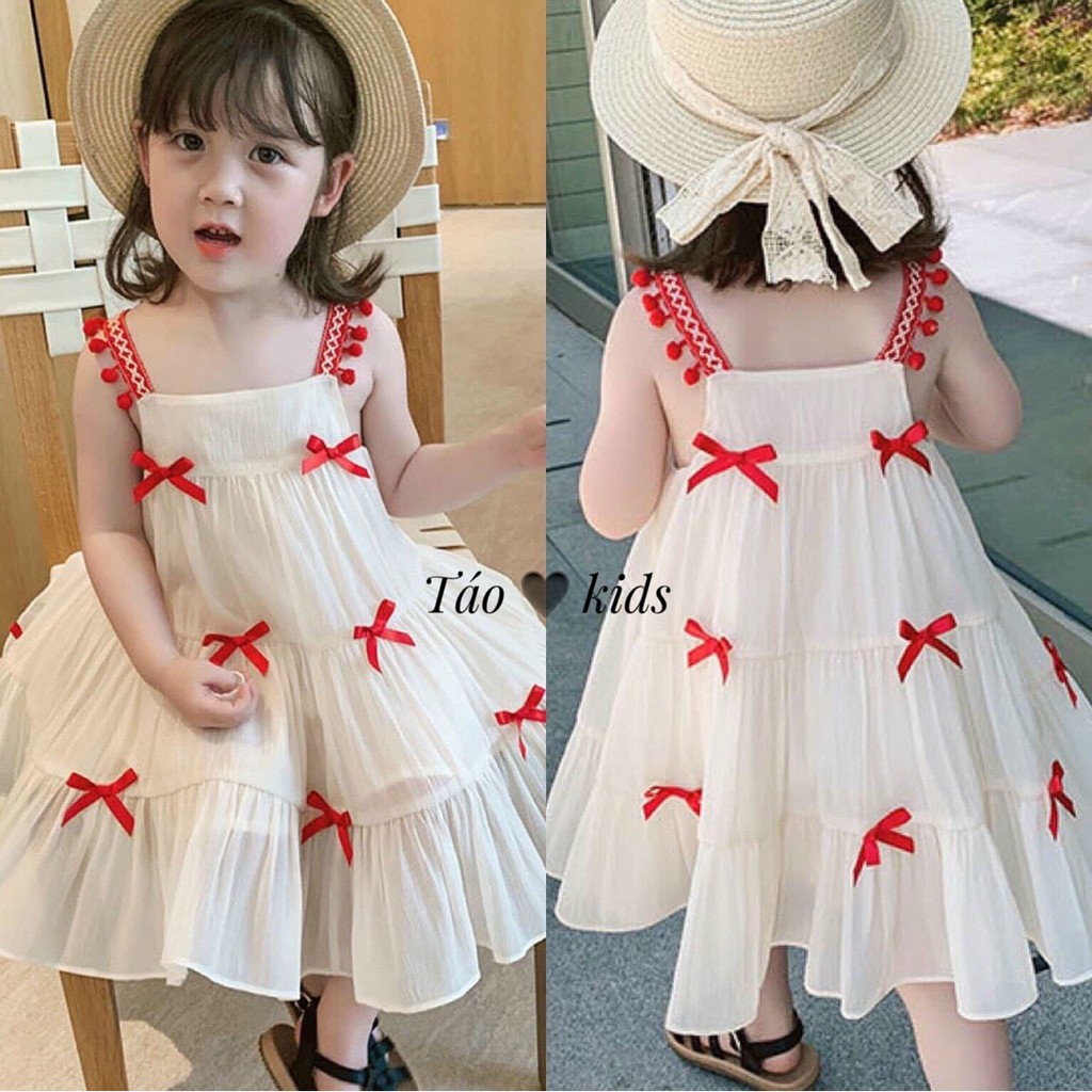 Váy 2 dây đũi trắng đính nơ đỏ