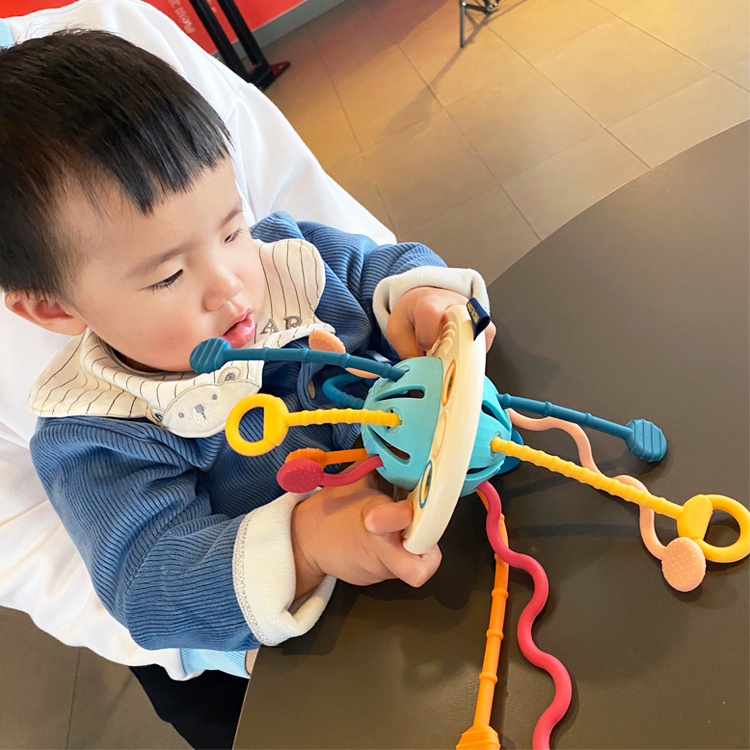 Đồ chơi rút dây thông minh rèn luyện kĩ năng cầm, nắm cho bé mẫu đĩa bay xanh