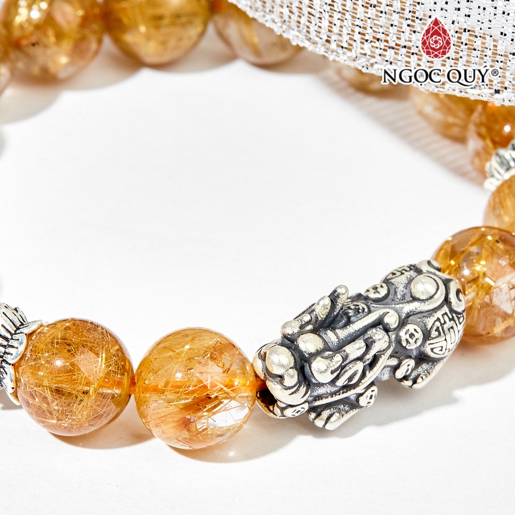 Vòng tay TA tóc vàng phối charm bạc - Ngọc Quý