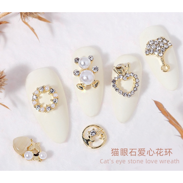 Họa tiết phụ kiện tròn đính kim cương và ngọc trai giả/đá mắt mèo nhiều kiểu dáng trang trí móng tay