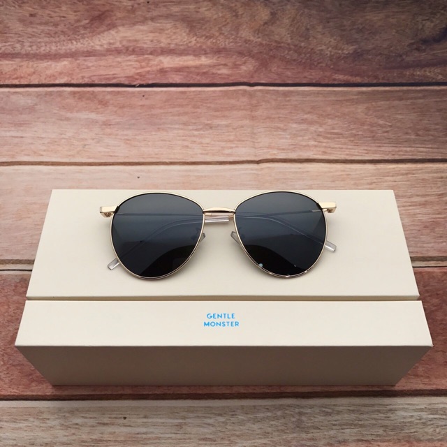 Kính thời trang mắt vàng đi ngày đêm bagu BucShop dành cho nam nữ