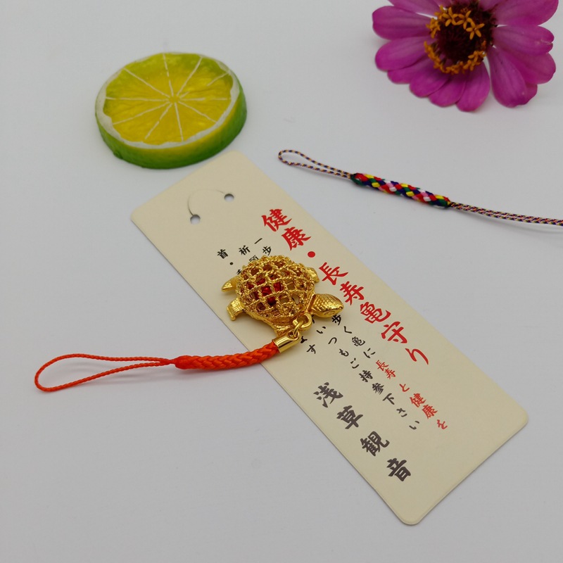 Hole Engraved Golden Turtle Bell