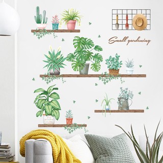 Decal dán tường kệ chậu cây lá nhiệt đới