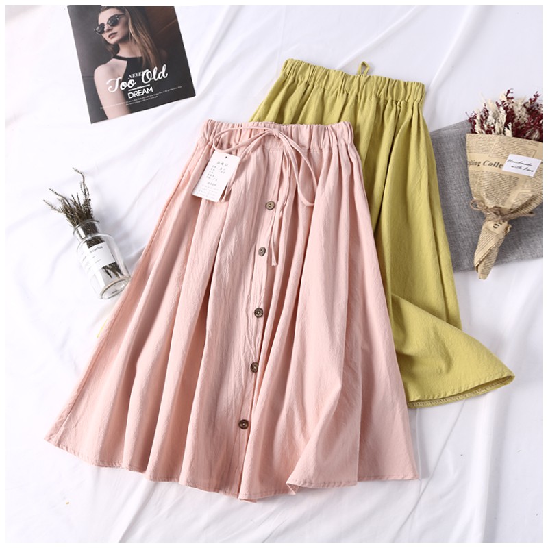 Chân váy đũi thoáng mát dài qua gối bánh bèo có nơ đính cúc - V5