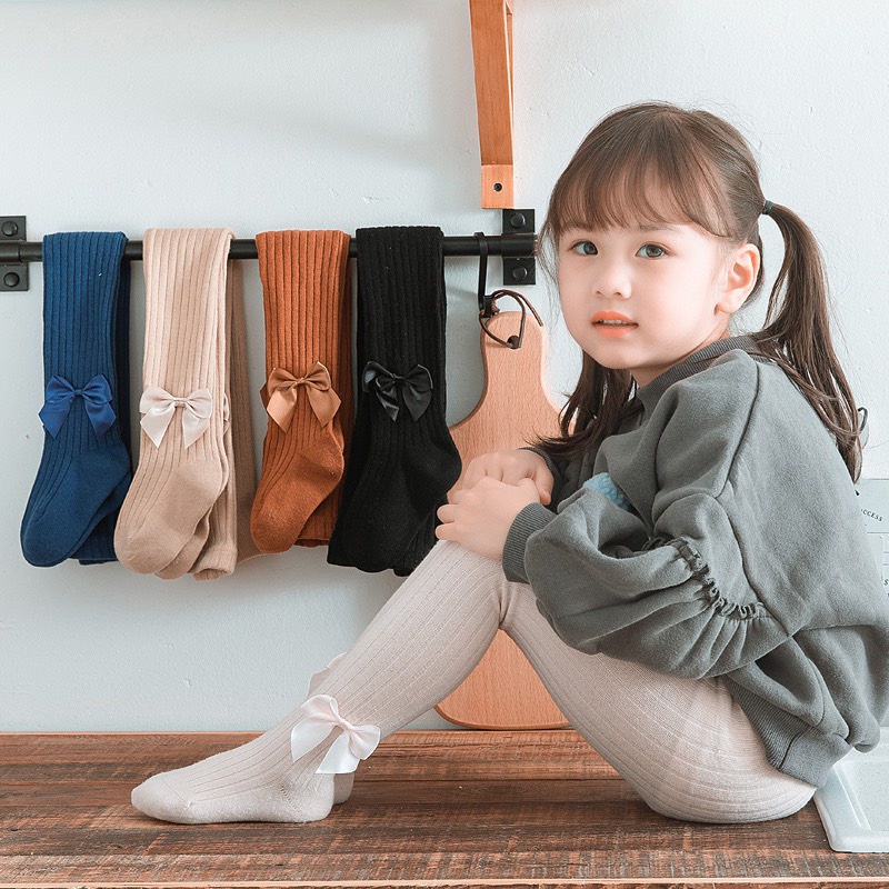 Quần tất cho bé, quần tất len mùa đông đính nơ màu trơn co giãn 4 chiều cho bé gái Xuân Cường Kids size từ 3m đến 6 tuổi