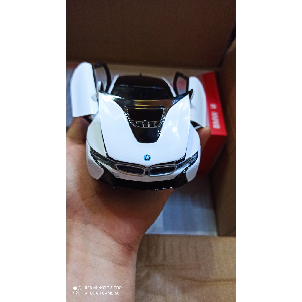 Mô hình xe ô tô siêu xe BMW I8 Hãng Rastar tỉ lệ 1:24 màu trắng, vỏ hợp kim, mở được cửa