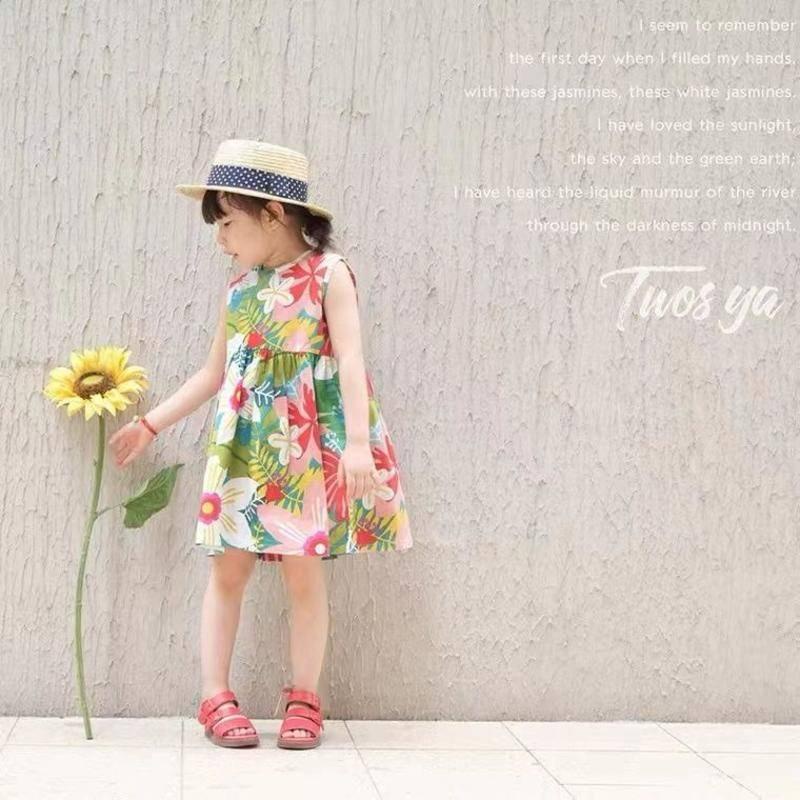 Đầm hoa phong cách công chúa hở lưng thời trang cho bé