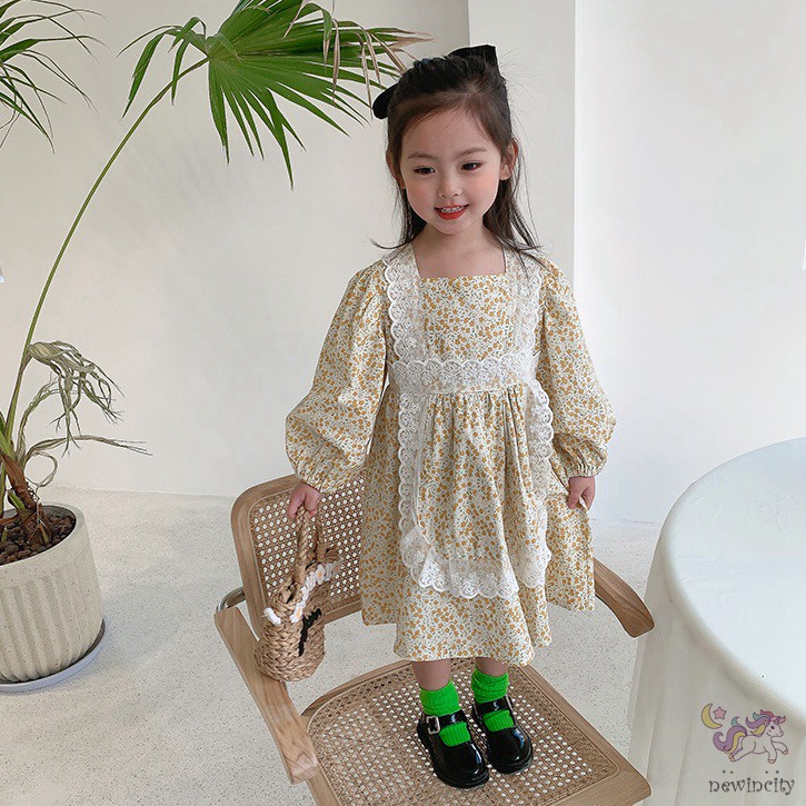 Đầm Cổ Búp Bê Ren Hoa Cho Bé Gái