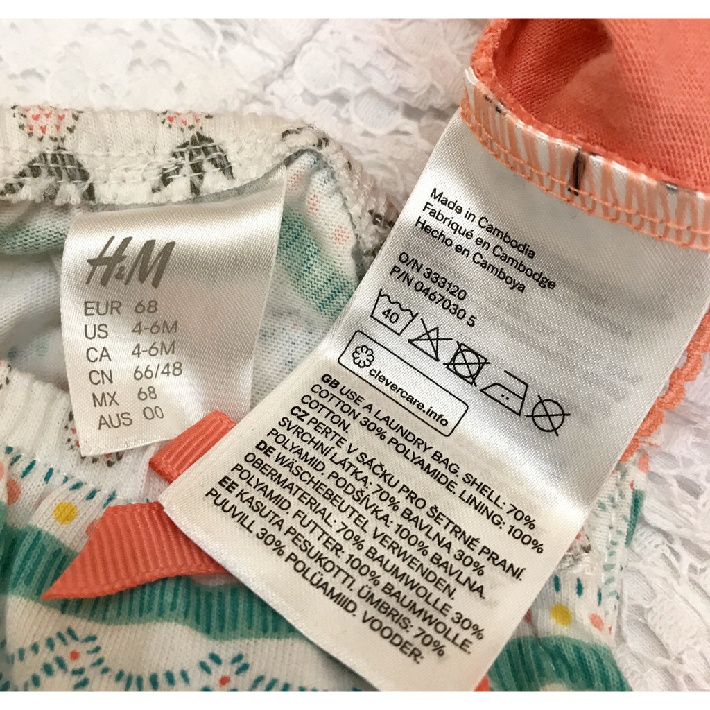 Romper bé gái H&M màu trắng sz 6-11kg