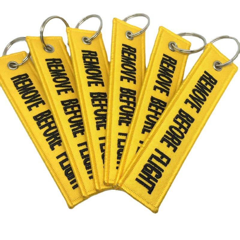 Móc chìa khóa in chữ Before Flight độc đáo