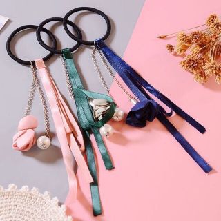 Buộc tóc cột tóc hoa rơi