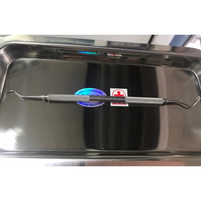Dụng cụ nhấn mí