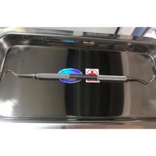 Dụng cụ nhấn mí