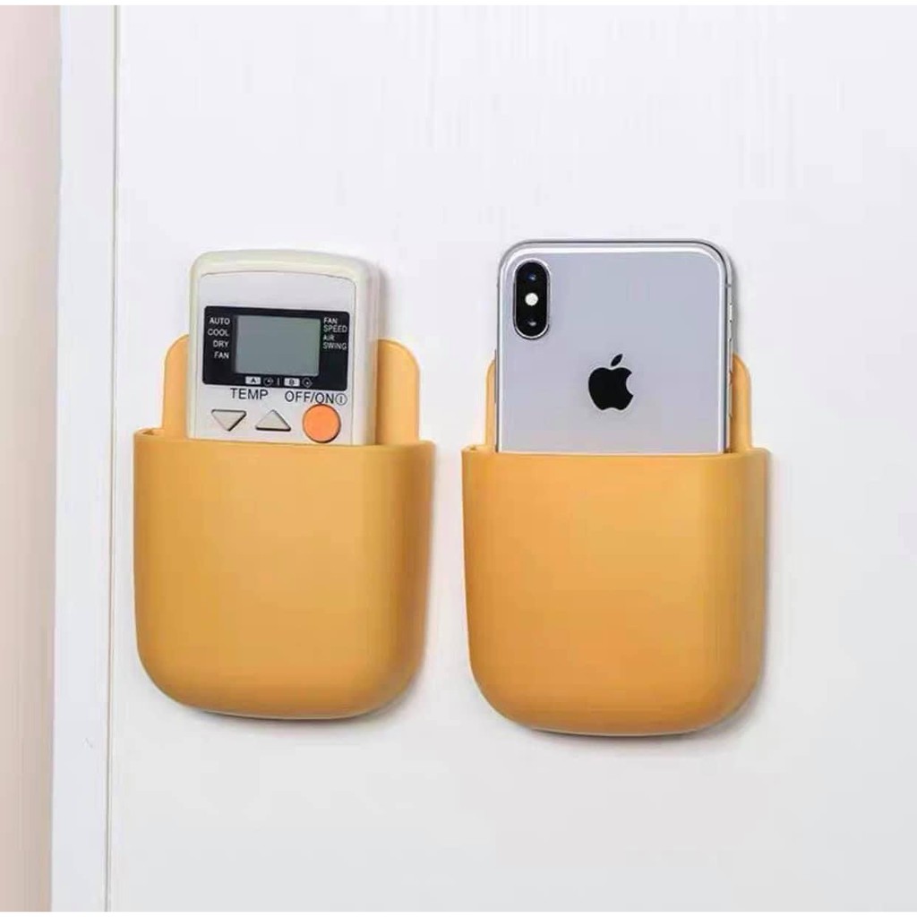 Khay gắn tường để đựng remote điều khiển máy lạnh tiện dụng.