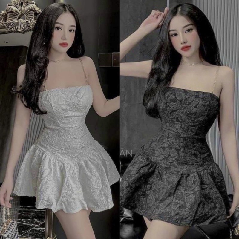 Đầm gấm xoè phối dây xích