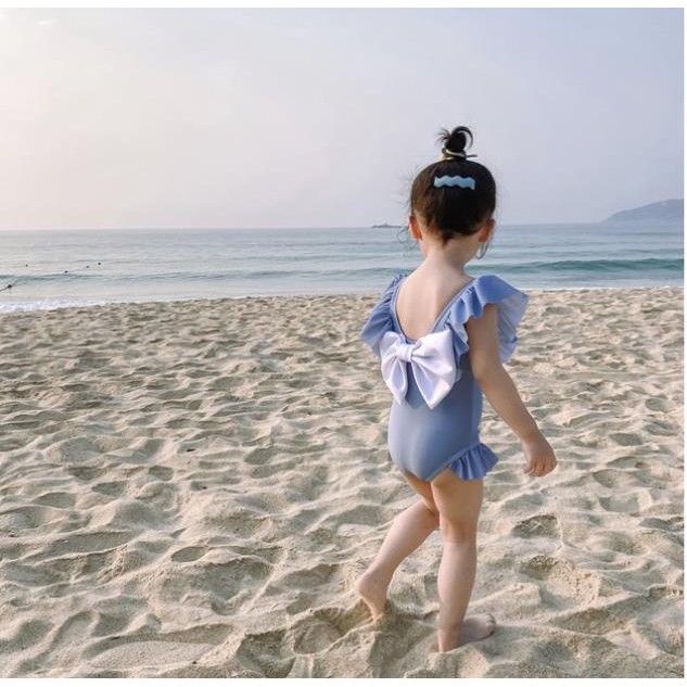 Bộ bơi liền xanh đính nơ trắng dành cho bé gái đi biển mùa hè mã C10