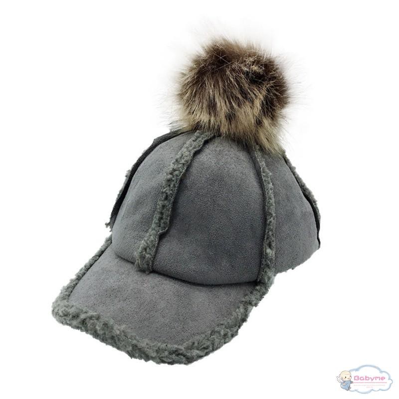 Mũ lưỡi trai màu trơn đính quả bông dễ thương cho bé