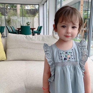 Váy thô thêu hoa cho bé