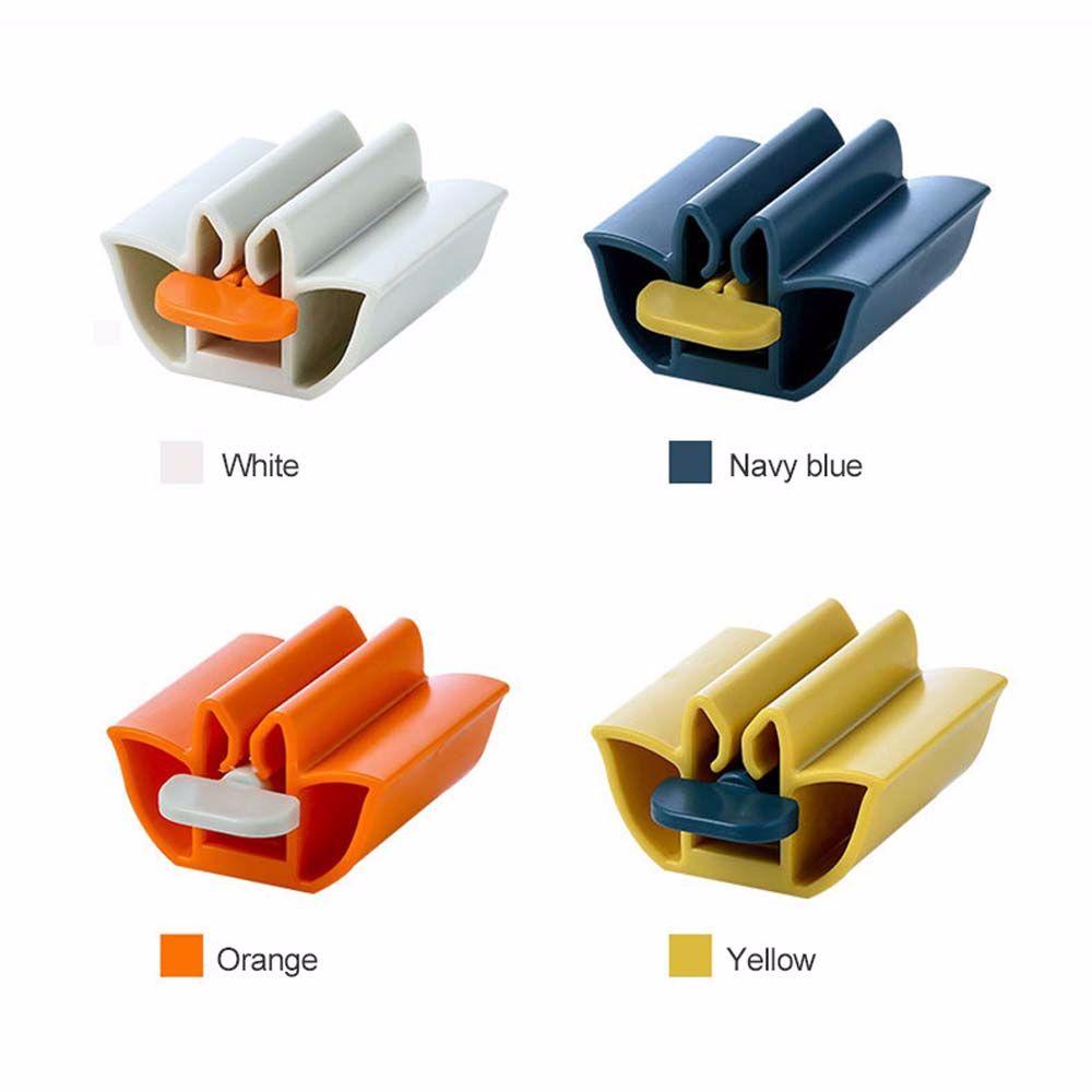 Dụng Cụ Nặn Kem Đánh Răng Bằng Nhựa Dạng Ấn Tiện Dụng