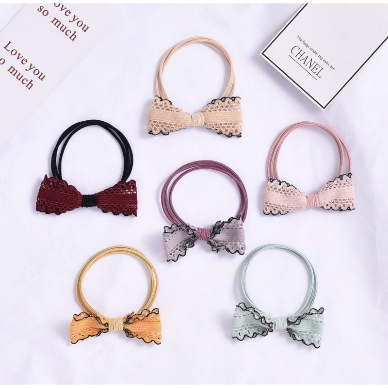 Thun buộc tóc hình nơ