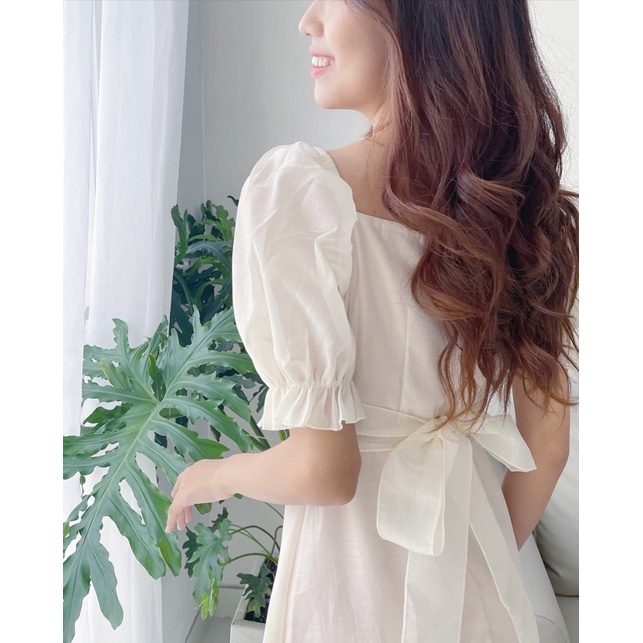 Đầm trắng xoè đi tiệc nhúng ngực nơ sau thun vai xuongvnxk