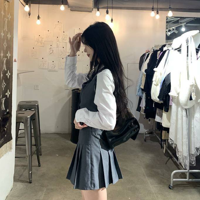 Set áo khoác không tay + áo sơ mi tay dài+ chân váy + cà vạt thời trang cho nữ