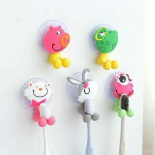 Dụng cụ kẹp bàn chải hình thú