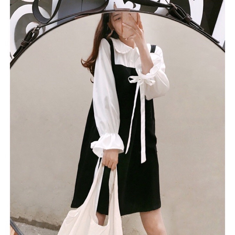 Váy yếm nữ cổ sen sơ mi trắng dài tay thân yếm đen, Váy nữ đi chơi babydoll điệu đà nơ tay bánh bèo  (TTA112)
