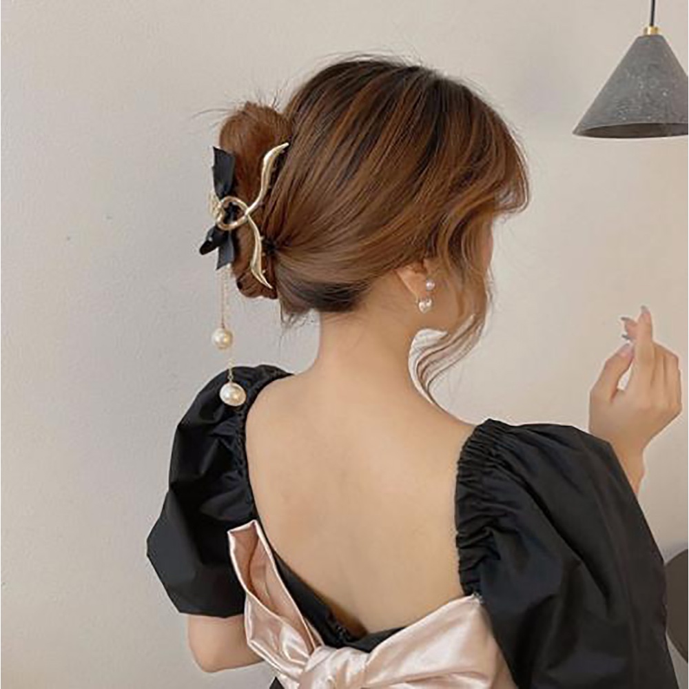 Kẹp tóc càng cua có tua rua đính nơ xinh xắn DTonline