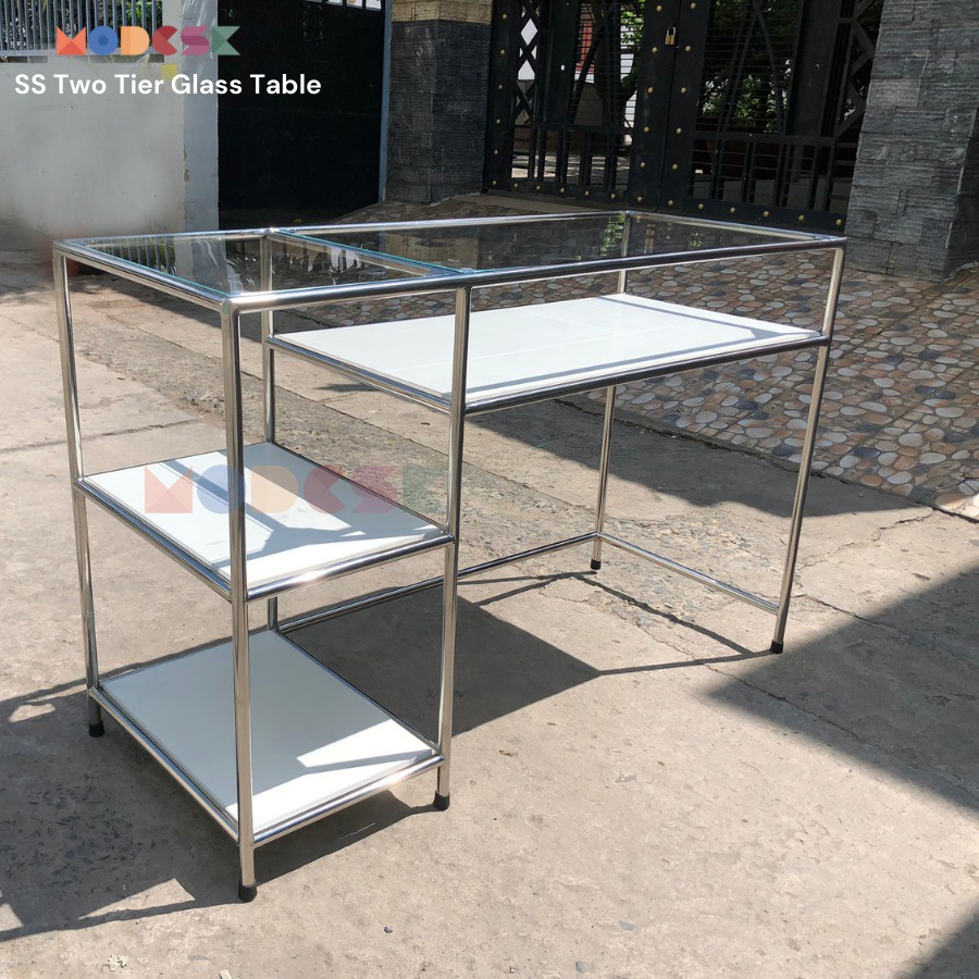 Bàn Studio làm lviệc Modesk SS Two Tier Glass Table khung inox 304, ván MFC An Cường, kính cường lực