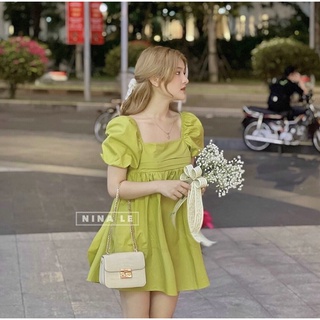 Đầm bbd tay phồng nơ lưng xanh