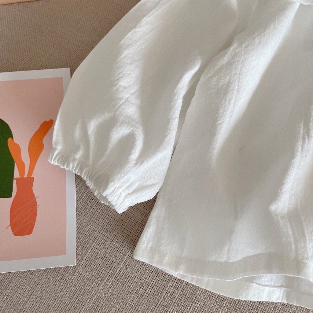 Áo sơ mi cổ sen bé gái chất vải chống nhăn