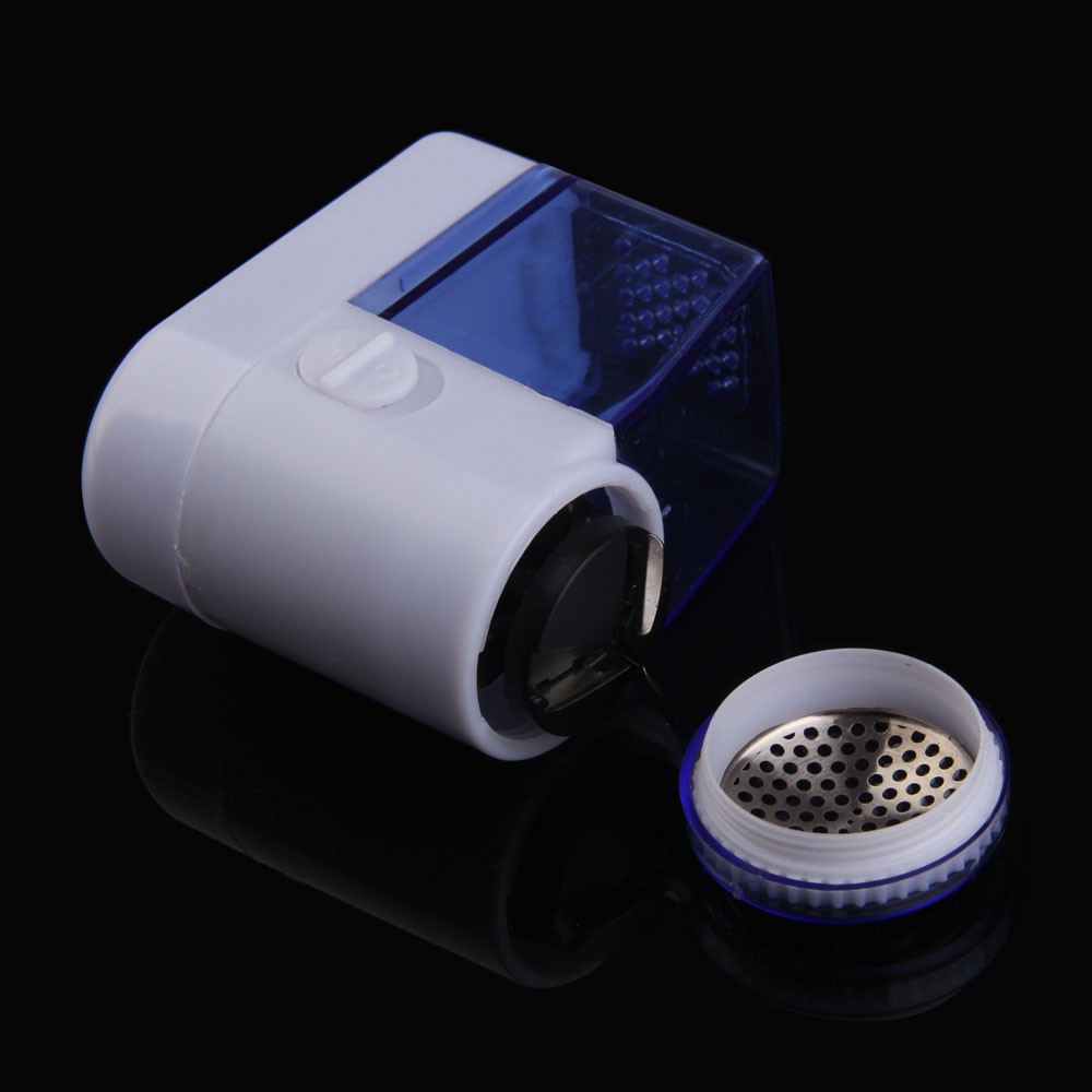 Máy cạo xơ vải trên quần áo sweater